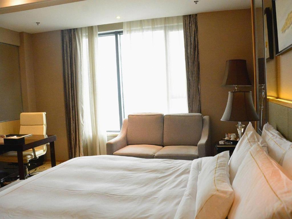 วินด์แฮม แกรนด์ พลาซา รอยัล มิงฟา จางโจว Hotel Zhangzhou ภายนอก รูปภาพ
