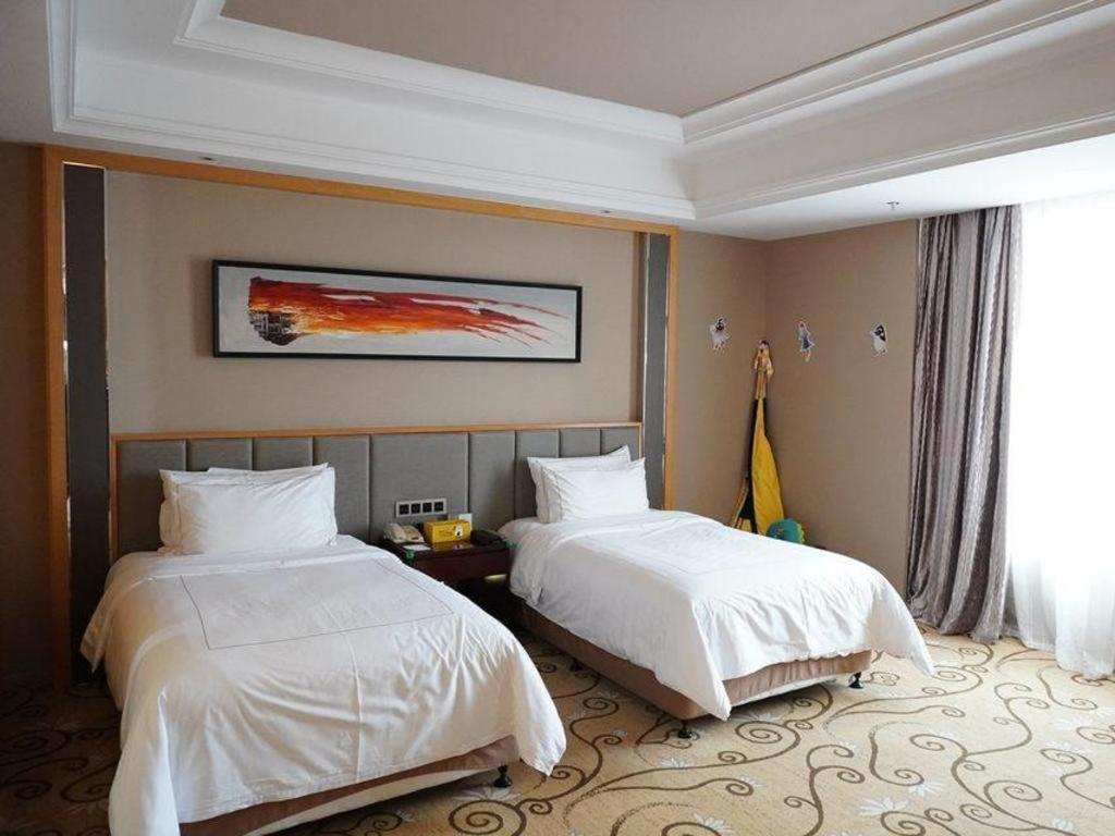 วินด์แฮม แกรนด์ พลาซา รอยัล มิงฟา จางโจว Hotel Zhangzhou ภายนอก รูปภาพ